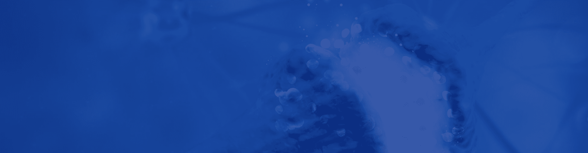 Abstract blue and purple wave background with light glowing effects