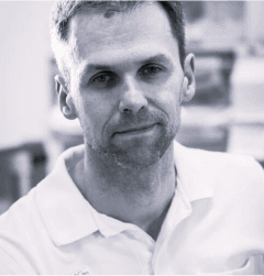 Professional headshot of Stefan, a male cancer care expert